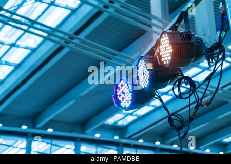 spotlights on a theatre stage lighting rig for consert Stock Photo