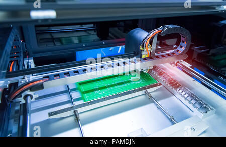 pcb board soldering iron tips of automated manufacturing soldering and assembly Stock Photo