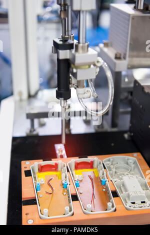 Close up soldering Robotic vision sensor camera system and assembly printed electric circuit board Stock Photo