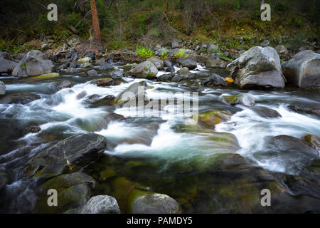 Nature landscape with long exposure Whitewater rapids  - Tuolumne River in Groveland, California. Stock Photo