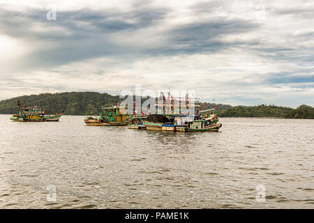 Anchor boats at the harbour at the bay in Kota Kinabalu, Northern Borneo, Malaysia. Stock Photo