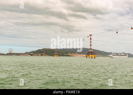 Cable car is running over the sea to Vinpearl Amusement Park on Hon Tre Island, Nha Trang, Vietnam. Stock Photo