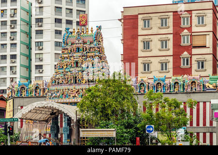 Singapore, January 12, 2018: Traffic on the street in front of Sri Veeramakaliamman Hindu temple in Little India, Singapore. Stock Photo