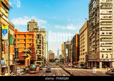 Taipei, Taiwan - January 16, 2018: View at one of the main roads in Taipei and Taipei 101 famous landmark tower, building at the background in Taipei, Stock Photo