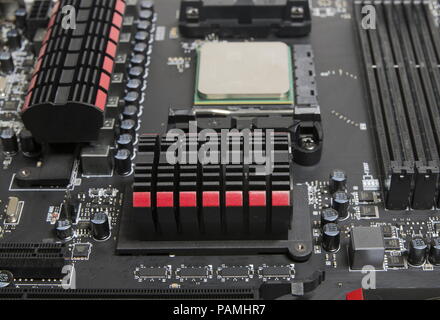 Installing the processor on the motherboard Stock Photo
