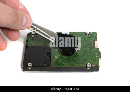 The hard disk is cleaned from dust Stock Photo