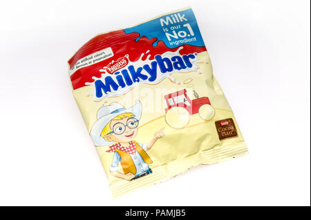 Nestle Milkybar Chocolate button on a white background Stock Photo
