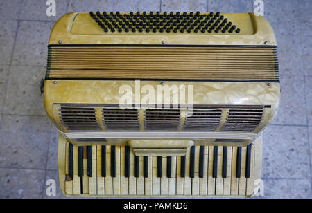 Musical instrument - Front view very rare vintage acoustic guitar folk  country isolated on a orange background Stock Photo - Alamy