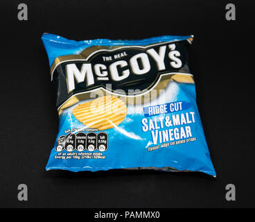 Reading, United Kingdom - July 08 2018:   A Packet of McCoys potato crisps, Salt and Vinegar flavour Stock Photo