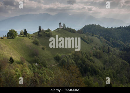 Saints Primus and Felician Church on a hillside in Jamnik, Slovenia, in the spring morning. Stock Photo