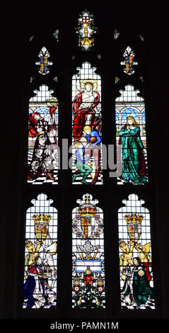 Winchester, United Kingdom - April 29 2018:   A stained glass window in Winchester Cathedral commemorating the cornations of George VI and Elizabeth I Stock Photo
