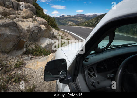 White truck window view on roadside, at Pacific Grade Summit - Mountain Highway 4, California Stock Photo