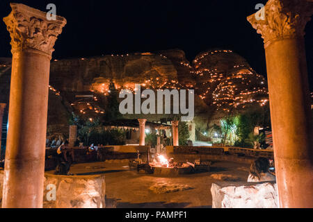 the view at night over the common area of a tourist Bedouin camp in Wadi Musa, near Petra, Jordan Stock Photo