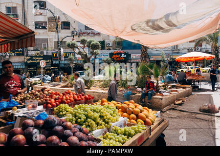 a busy produce market in Ramallah, Palestine Stock Photo