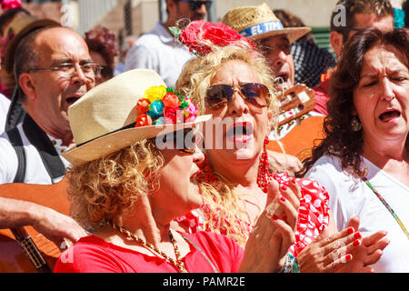 Arroyo de la Miel, Spain - 17/6/2018: People singing at a fiesta. There are many festivities throughout the year. Stock Photo