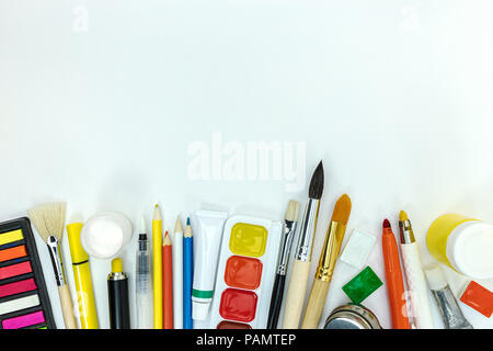 painters tools and supplies on white background. pencils, paints, markers for school kids flat view Stock Photo