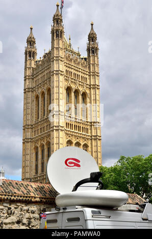 Outside Broadcast TV van with Gigasat satelite dish by the Houses of Parliament, Westminster, London, England, UK. Stock Photo