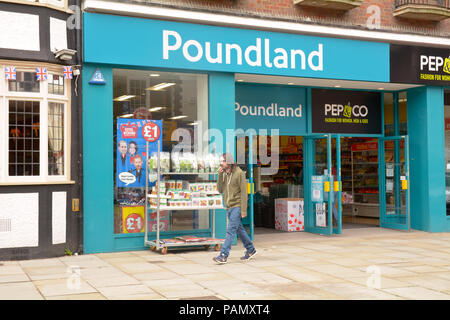 Poundland shop with people in HItchin town centre Hertfordshire England Stock Photo