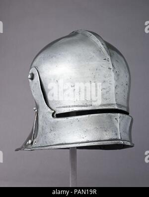 Sallet. Armorer: Jörg Wagner (Austrian, Innsbruck, recorded 1485-92). Culture: Austrian, Innsbruck. Dimensions: D. of tail 7 1/2 in. (19.1 cm). Date: ca. 1485-95.  This sallet is by Jörg Wagner (recorded 1485-92). The armorers of Innsbruck, capital of the Austrian Tirol, thrived under the patronage of the Habsburg court and produced armor that was internationally renowned for the strength of its steel and the beauty of its form. Located near the border between Austria and Italy, this center produced armor that reflected the influence of north and south, combining the elongated and spiky German Stock Photo