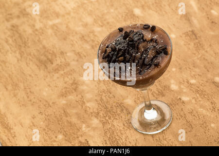 chocolate smoothie on a light brown background Stock Photo