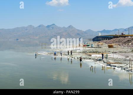 Urmia, Iran - April 8, 2018: Road bridge on Urmia Salt Lake. it was the largest lake in the Middle East, now on the verge of extinction Stock Photo