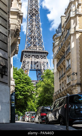 the eifel tower from the streets of paris on a sunny day Stock Photo