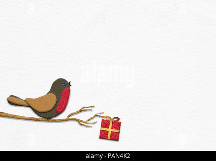 Christmas Robin handmade from paper collage style concept illustration on handmade water colour paper background Stock Photo