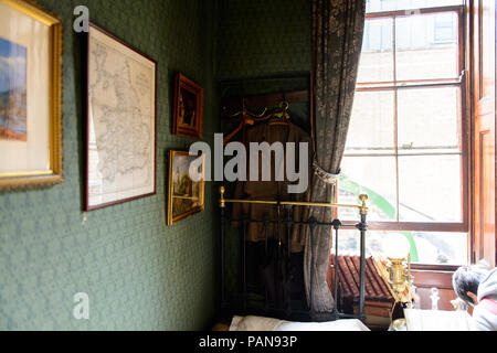 LONDON, ENGLAND - JUL 22, 2016: Interior of the Sherlock Holmes Museum, 221 Baker Street, London. Sherlock Holmes  is a fictional private detective cr Stock Photo