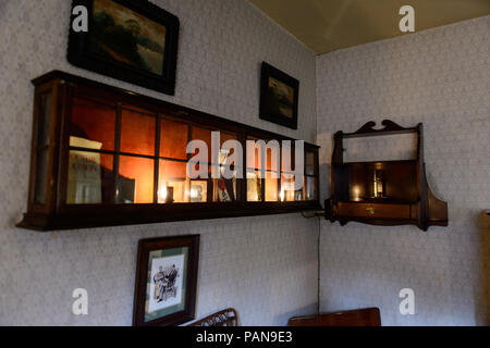 LONDON, ENGLAND - JUL 22, 2016: Interior of the Sherlock Holmes Museum, 221 Baker Street, London. Sherlock Holmes  is a fictional private detective cr Stock Photo