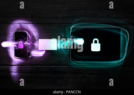 Locks on smartphone and digital tablet, data encryption Stock Photo