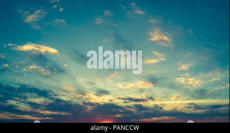 Aerial drone panoramic view of colourful sunset on the lake, only the sky, Russia Stock Photo