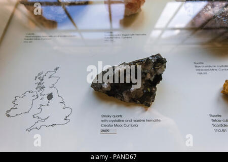 London, UK - March 19, 2018: Smoky quartz stone in the Minerals gallery of the Natural History Museum in London, which retains the original architectu Stock Photo