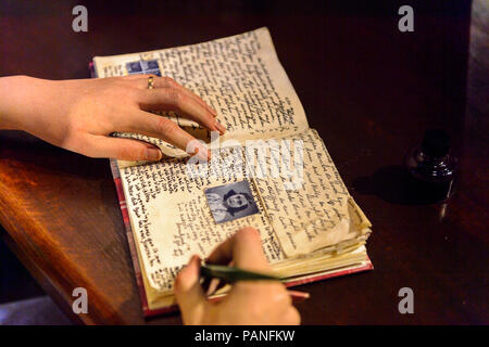 AMSTERDAM, NETHERLANDS - OCT 26, 2016: Anne Frank handwriting, Madame Tussauds wax museum in Amsterdam. One of the popular touristic attractions Stock Photo