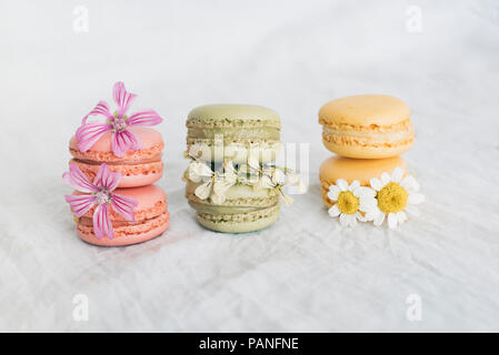 Macarons with blossoms Stock Photo
