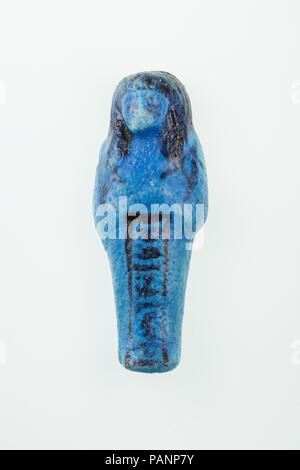 Worker Shabti of Nany. Dimensions: H. 8.7 ×W. 3.3 × D. 2 cm (3 7/16 × 1 5/16 × 13/16 in.). Dynasty: Dynasty 21. Reign: reign of Psusennes I. Date: ca. 1050 B.C..  See 30.3.28.1a, b. Museum: Metropolitan Museum of Art, New York, USA. Stock Photo