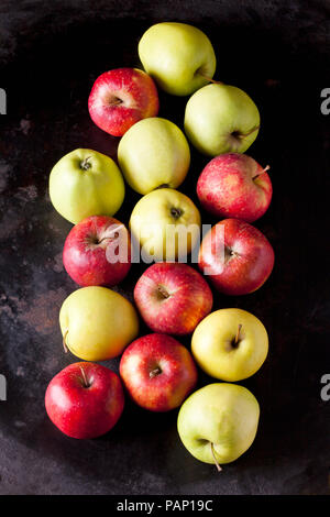 Various apples on dark ground Stock Photo