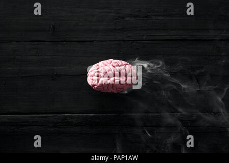 Smoking brain, burnout Stock Photo