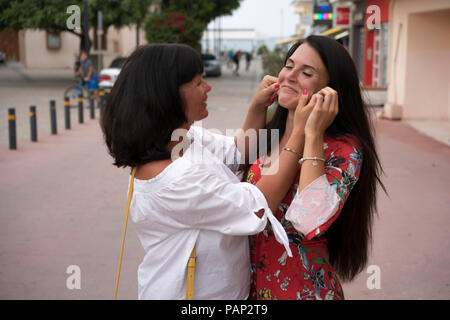 Greece, Crete, Limenas Chersonisou, mother and adult daughter having fun together Stock Photo