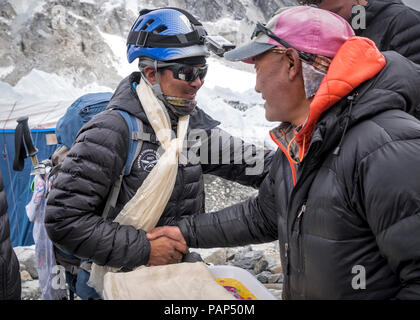 Nepal, Solo Khumbu, Everest, Sagamartha National Park, People greeting at the base camp Stock Photo