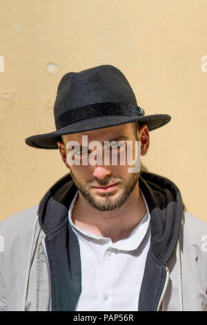 Portrait of bearded man wearing black hat Stock Photo