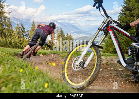 Austria, Tyrol, female downhill mountain biker Stock Photo