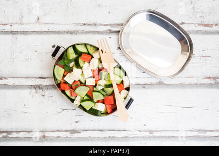 Lunch box, watermelon salad with feta, cucumber, ment and lime dressing Stock Photo