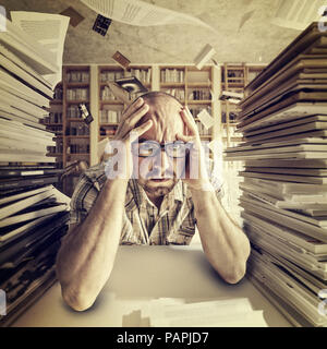 stressed student portrait in library Stock Photo