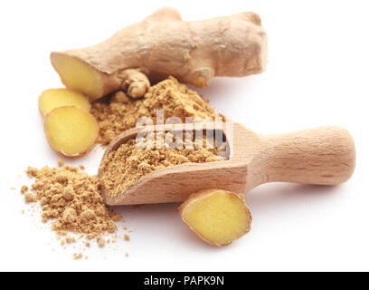 Ginger with dried powder over white background Stock Photo