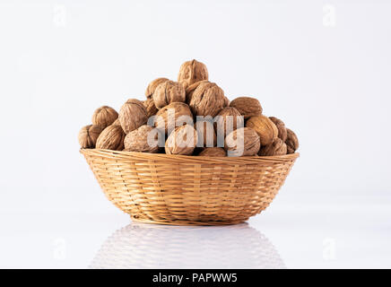 Nuts in basket Stock Photo
