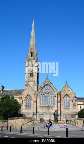 View of St Marys Cathedral with people sitting on the steps in the foreground, Newcastle upon Tyne, Tyne and Wear, England, UK, Western Europe. Stock Photo