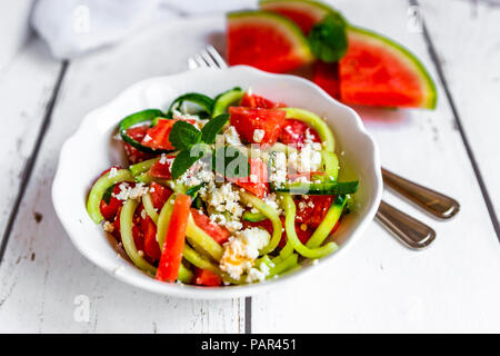 Bowl of salad with watermelon, cucumber, feta and mint Stock Photo