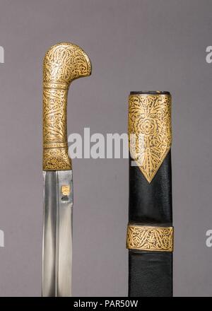 Sword with Sheath. Culture: Caucasian. Dimensions: H. with scabbard 39 7/8 in. (101.3 cm); H. without scabbard 37 5/8 in. (95.6 cm); W. 2 1/2 in. (6.4 cm); Wt. 1 lb. 10.6 oz. (754.1 g); Wt. of scabbard 7.9 oz. (224 g); Wt. of strap (c); 4.2 oz. (119.1 g). Date: 19th century. Museum: Metropolitan Museum of Art, New York, USA. Stock Photo