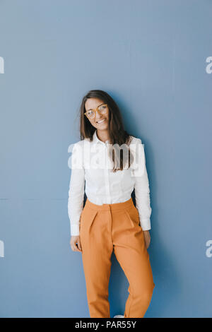 Portrait of a pretty, clever, young woman, wearing glasses Stock Photo