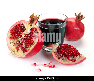 Jug of juice and ripe piece grenade on white background Stock Photo